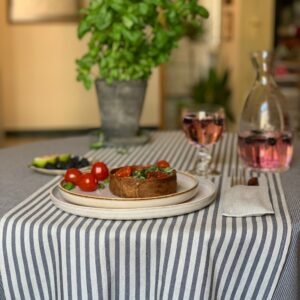 Nord 1 table runner in beige with blue stripes, made from recycled linen blend, handmade in Europe