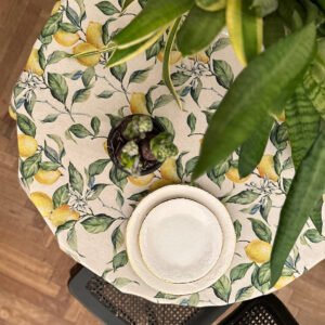 Round Lemon Linen tablecloth by Hortensias Home, cotton–linen blend with vibrant lemon print in Ø 140 and Ø 190 cm