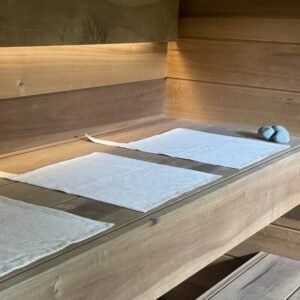 KOOSdisain linen sauna seat cover in natural tone with light woven stripes