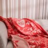 Red Friendsheep wool throw by Woolish